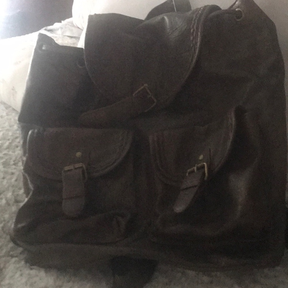 Claire’s brown backpack.